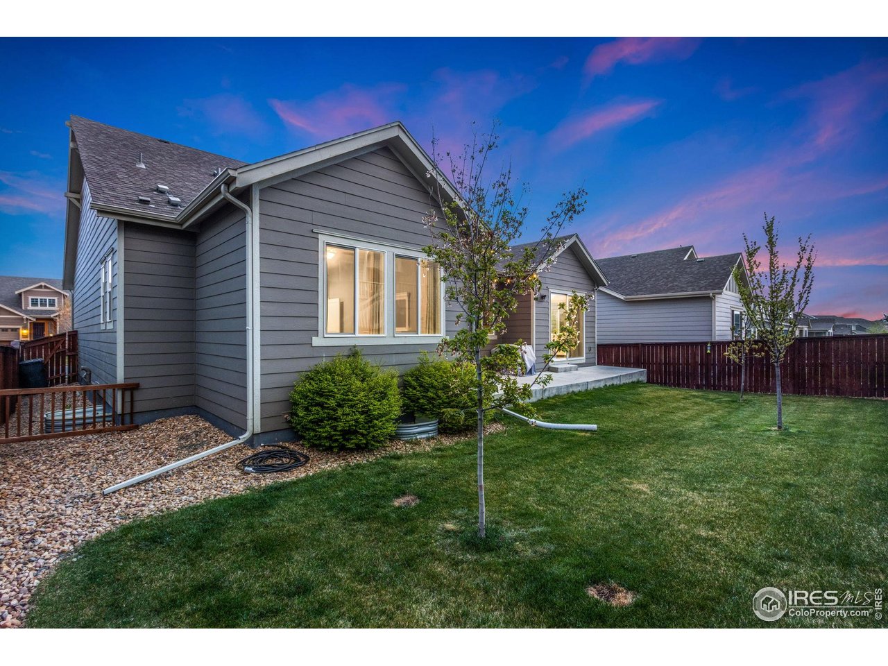 719 Wagon Bend Road Berthoud, CO 80513 - Photo 11 of 40 a front view of a house with a yard