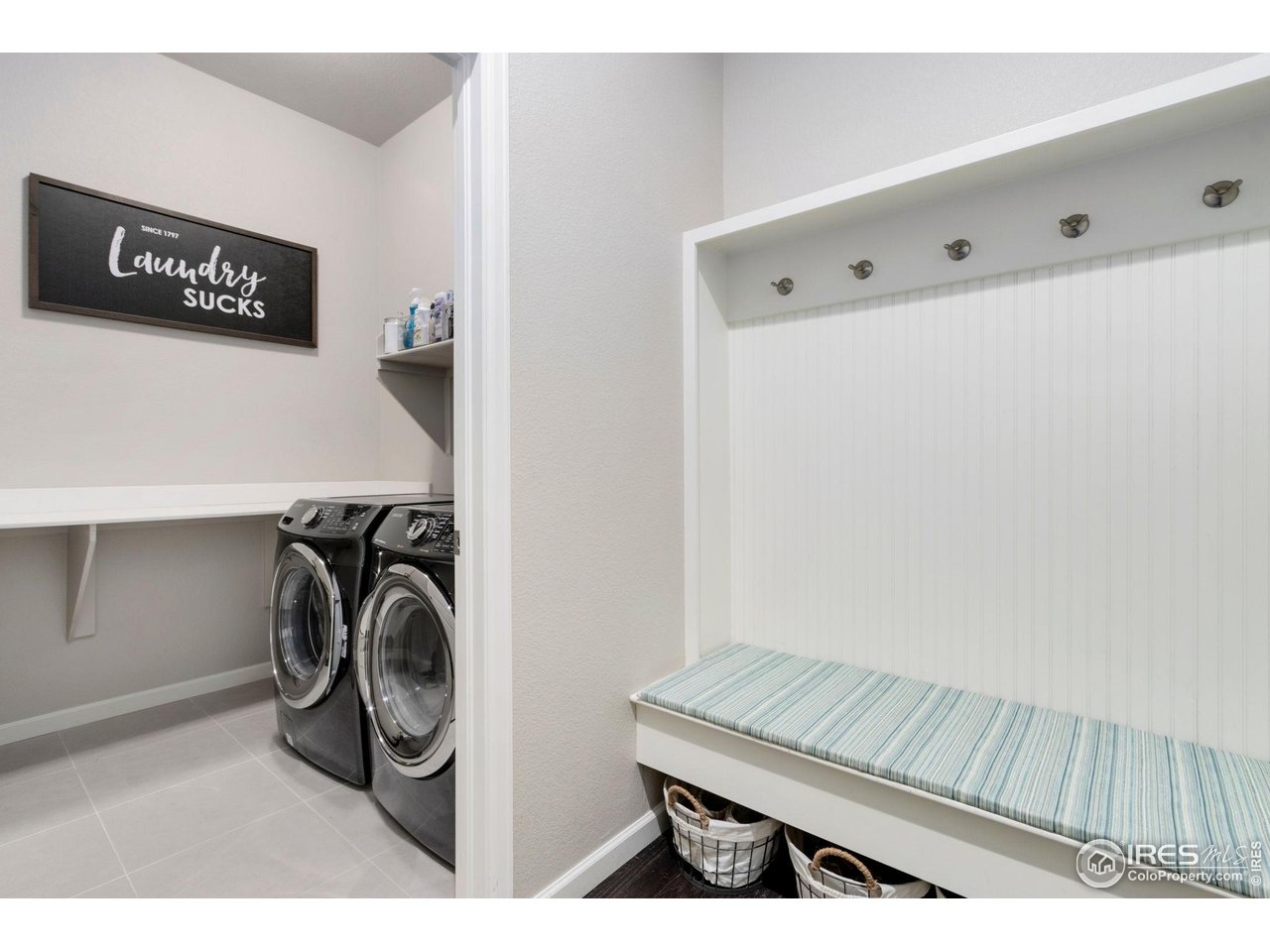 719 Wagon Bend Road Berthoud, CO 80513 - Photo 26 of 40 a utility room with dryer and washer
