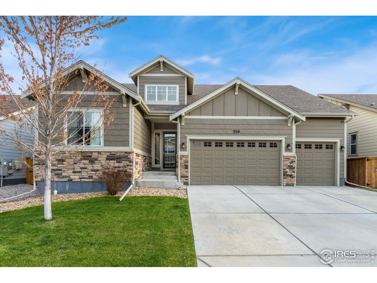 719 Wagon Bend Road Berthoud, CO 80513 - Photo 39 of 40 a front view of a house with a yard