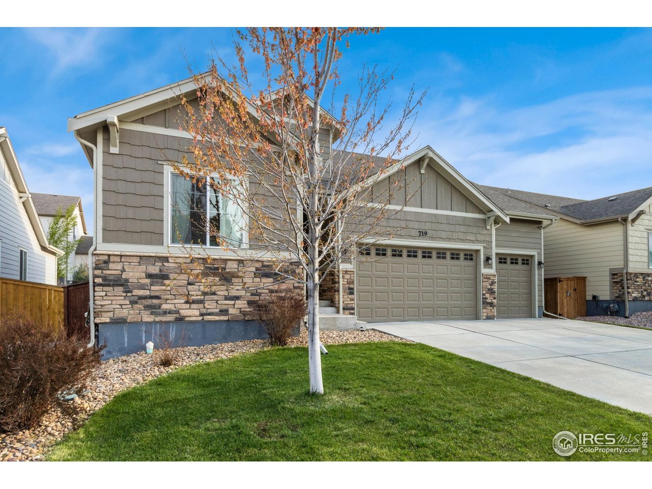 719 Wagon Bend Road Berthoud, CO 80513 - Photo 40 of 40 a front view of a house with a yard