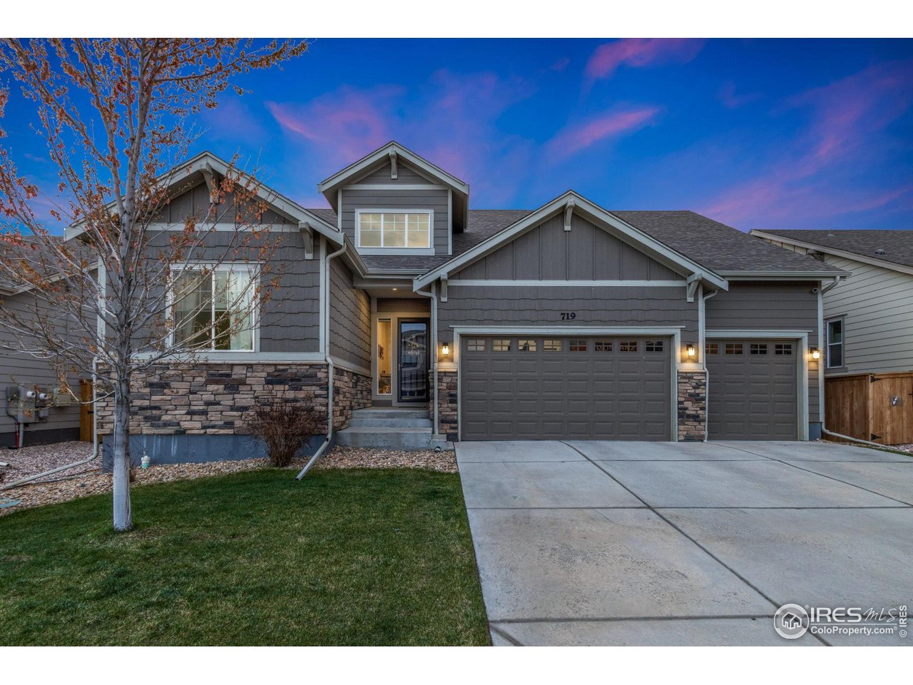 719 Wagon Bend Road Berthoud, CO 80513 - Photo 7 of 40 a front view of a house with a garden