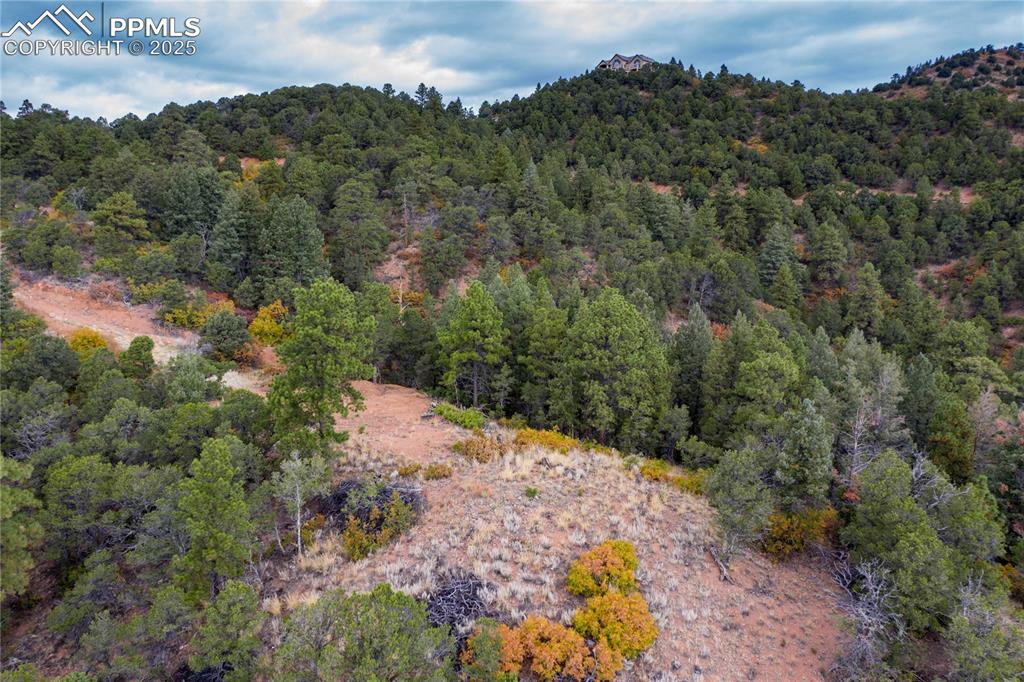 15825 Henry Ride Heights Colorado Springs, CO 80926 - Photo 14 of 23 an aerial view of a house