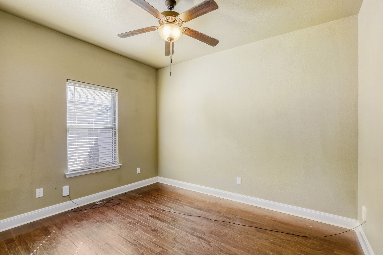 329 Jake Drive Jarrell, TX 76537 - Photo 12 of 17 Unfurnished room with light wood-type flooring and ceiling fan
