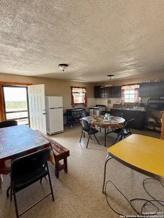 a workspace with furniture and window