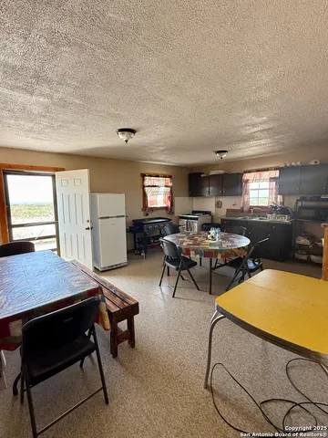 a workspace with furniture and window