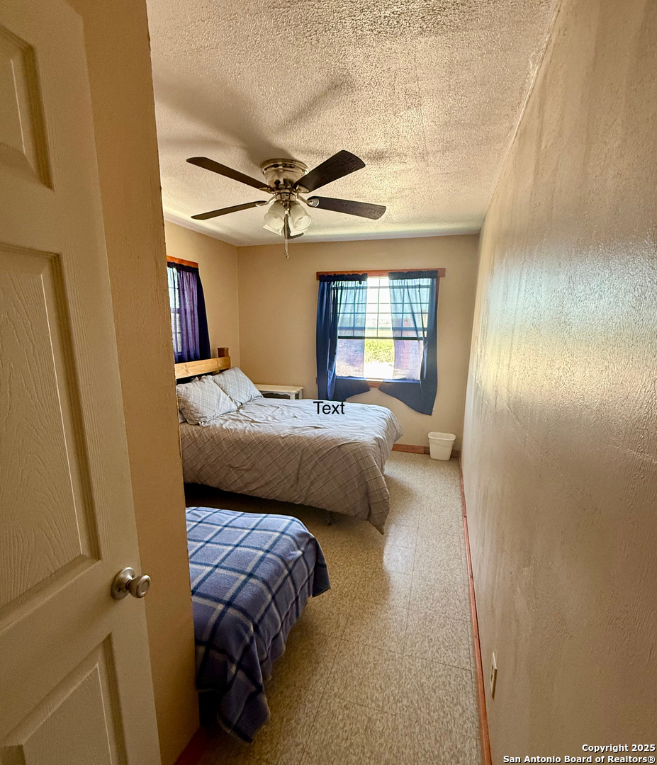 Tbd Other Sanderson, TX 79848 - Photo 8 of 36 a bedroom with a bed couch and window