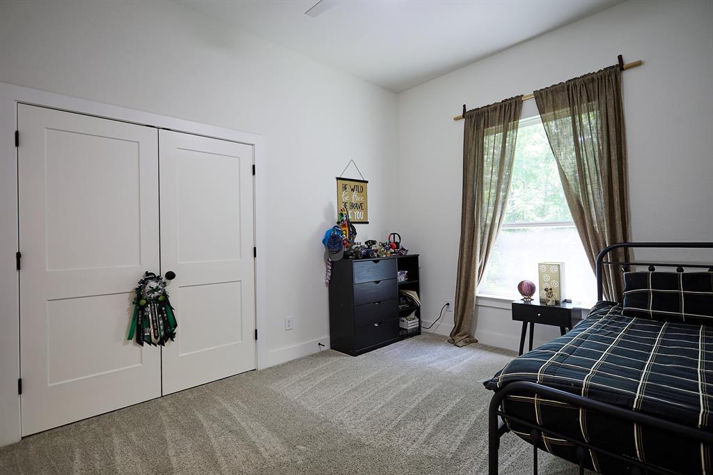 358 Glade Valley Road Azle, TX 76020 - Photo 23 of 35 Light-colored carpeting complementing white walls