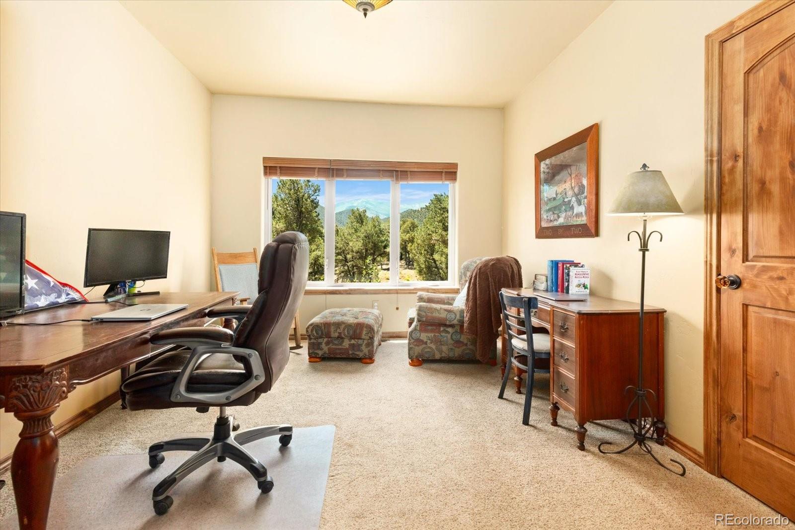 990 Hamilton Creek Road Coaldale, CO 81222 - Photo 17 of 49 a view of a workspace with furniture and a window