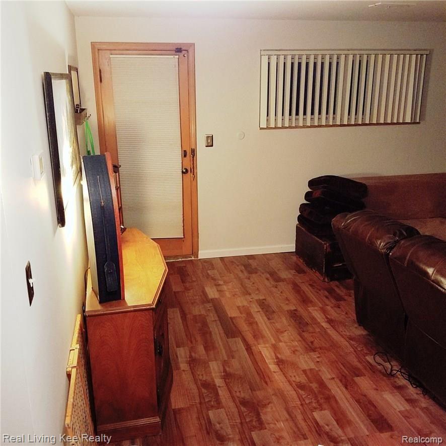11201 Racine Road Warren, MI 48093 - Photo 22 of 23 Living Room Lower (2).jpg