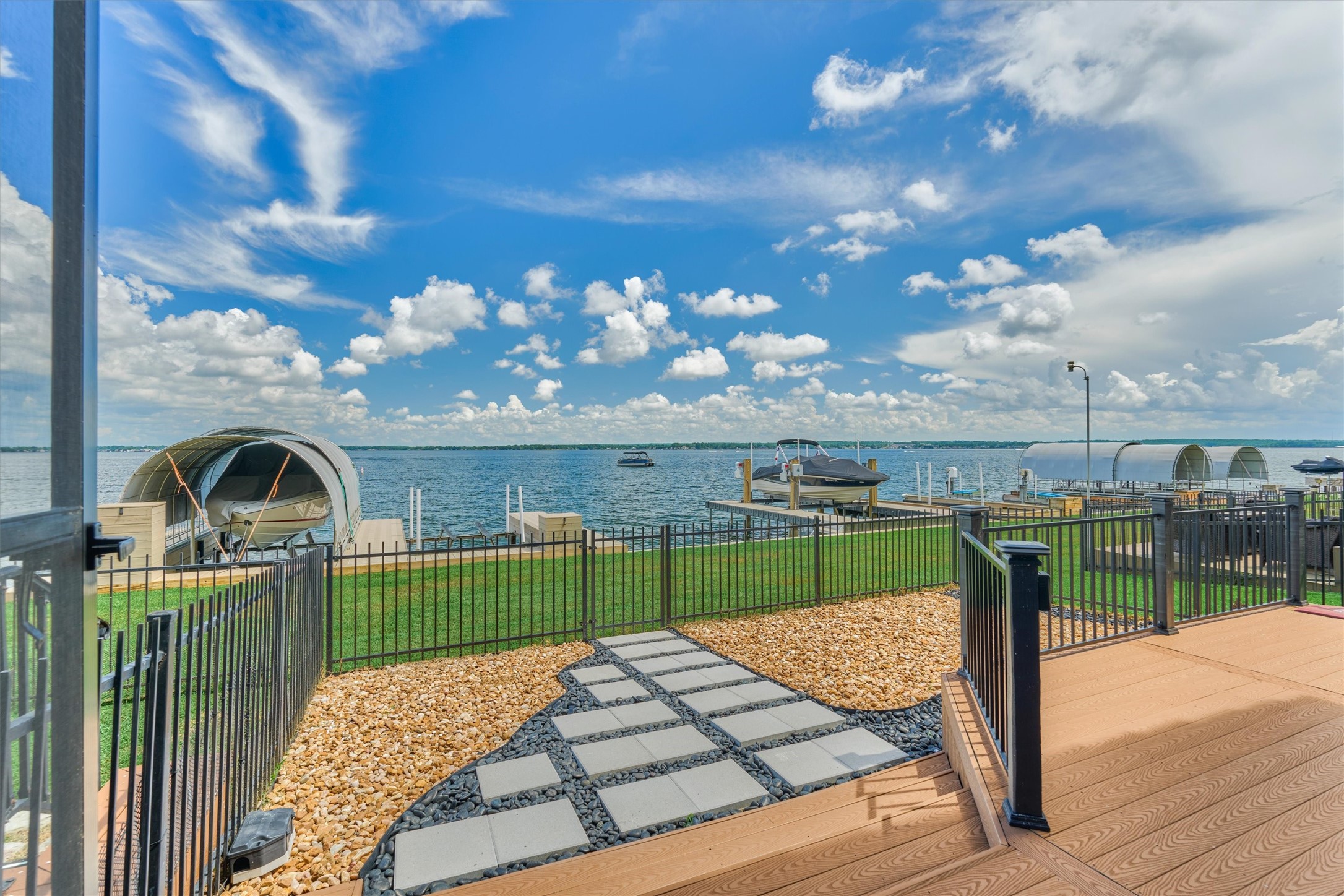 4 Regency Point Montgomery, TX 77356 - Photo 35 of 47 Composite decking and stone design inside their gated yard.