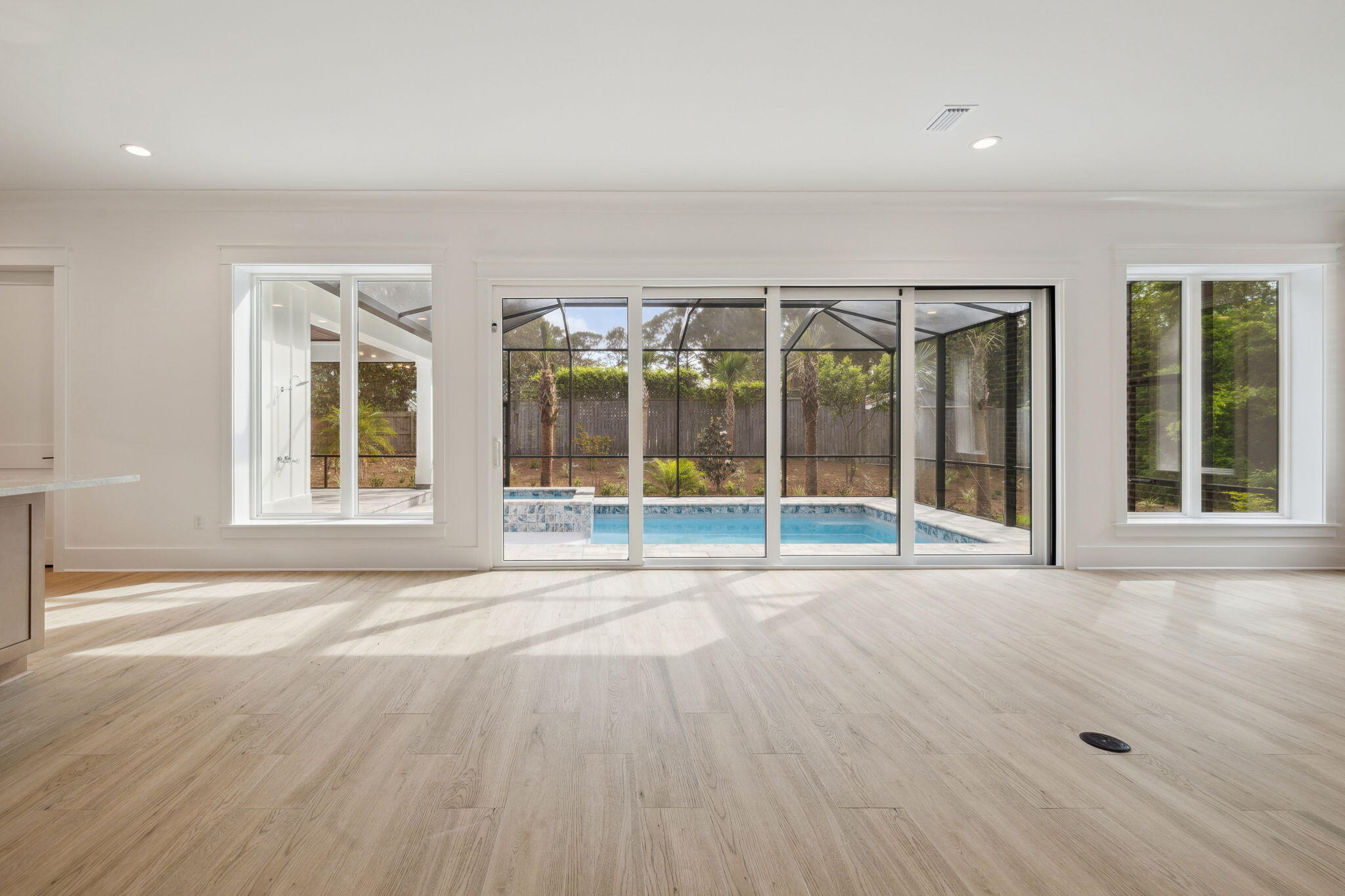 111 Dolphin Drive Santa Rosa Beach, FL 32459 - Photo 13 of 21 a view of an empty room with glass door and windows