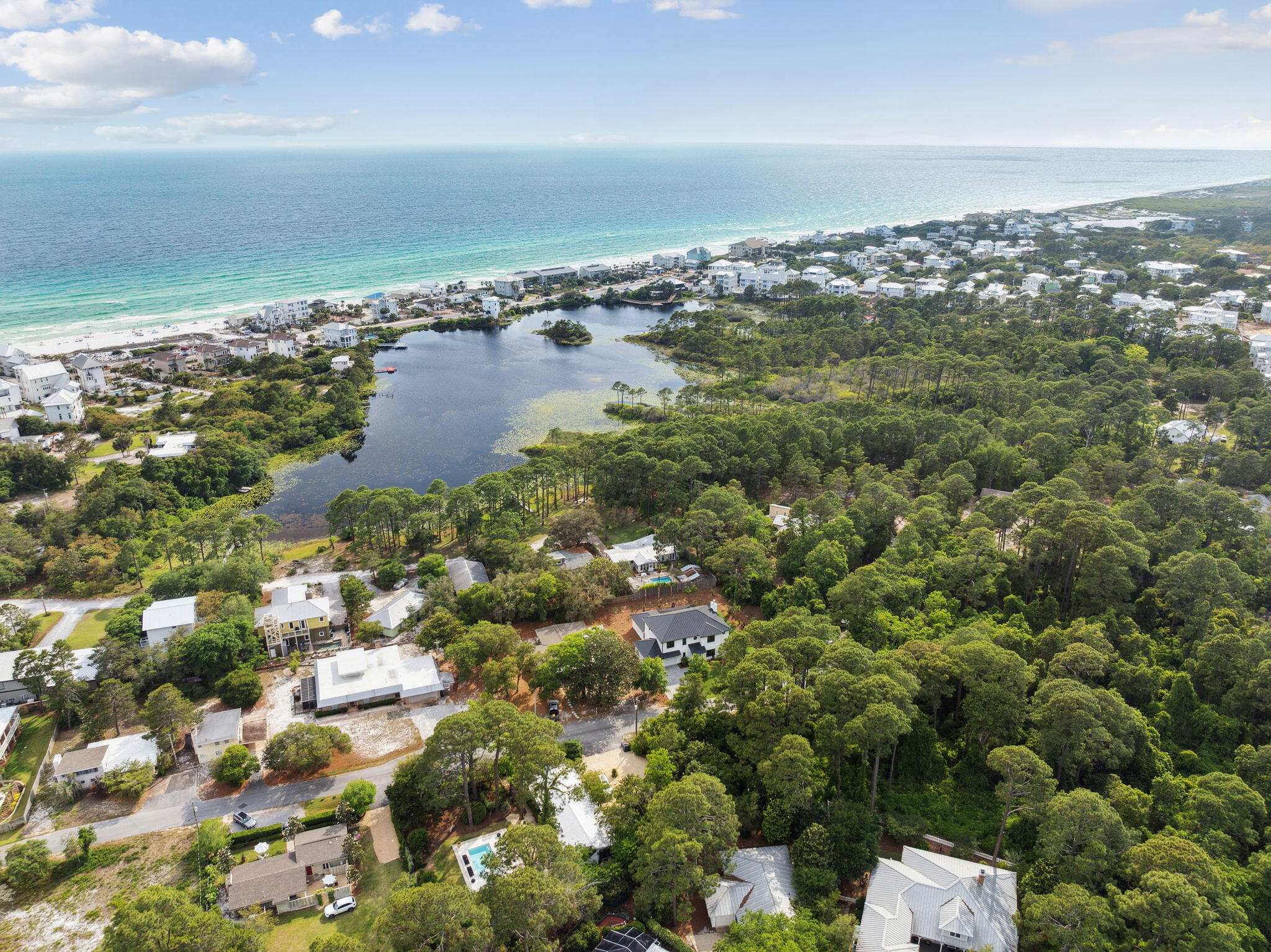 111 Dolphin Drive Santa Rosa Beach, FL 32459 - Photo 2 of 21 an aerial view of residential building with parking space