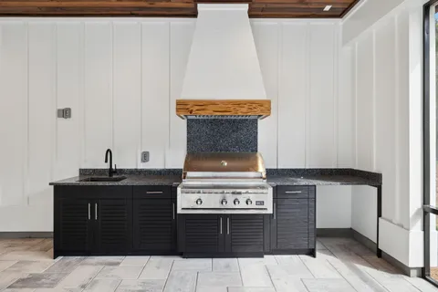 a view of an entryway with wooden floor and door