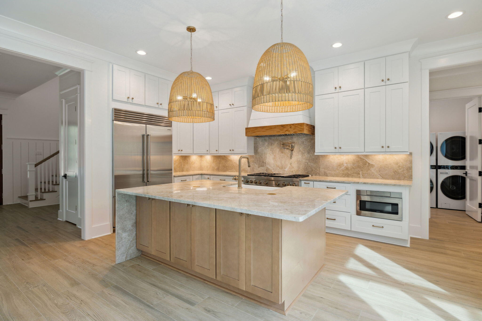 111 Dolphin Drive Santa Rosa Beach, FL 32459 - Photo 10 of 21 a kitchen with stainless steel appliances granite countertop a stove a sink and a refrigerator