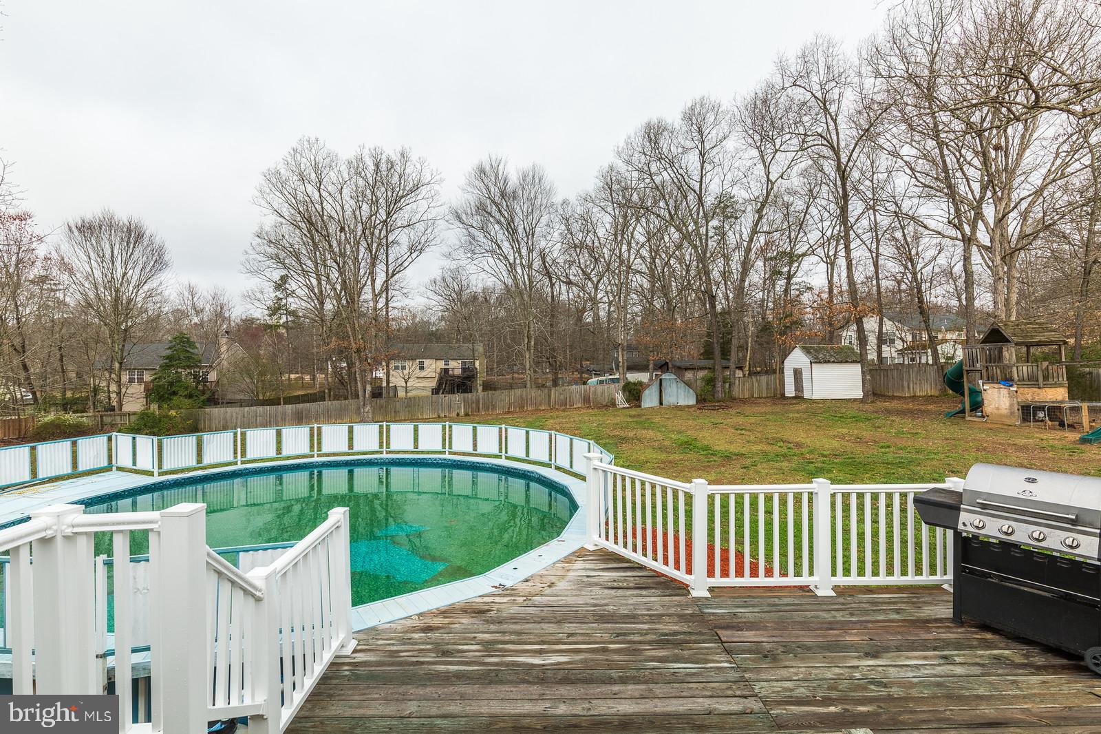 27 Ridge Road Stafford, VA 22556 - Photo 27 of 30 Football size rear yard with storage buildings