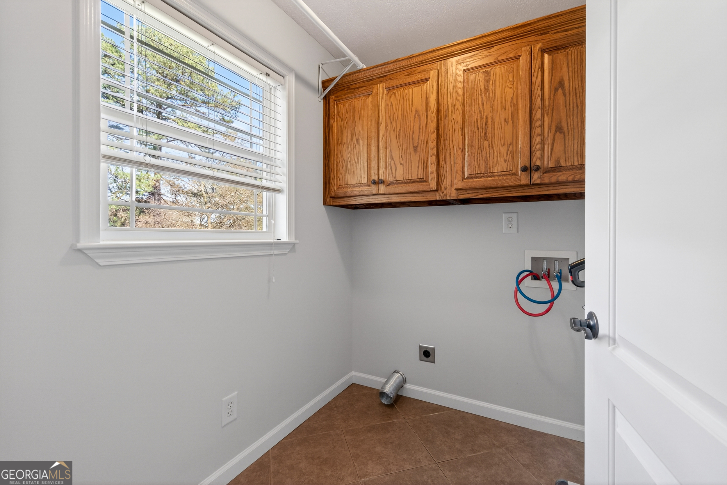 1211 Parham Town Road Bowman, GA 30624 - Photo 30 of 86 a room with storage and utility
