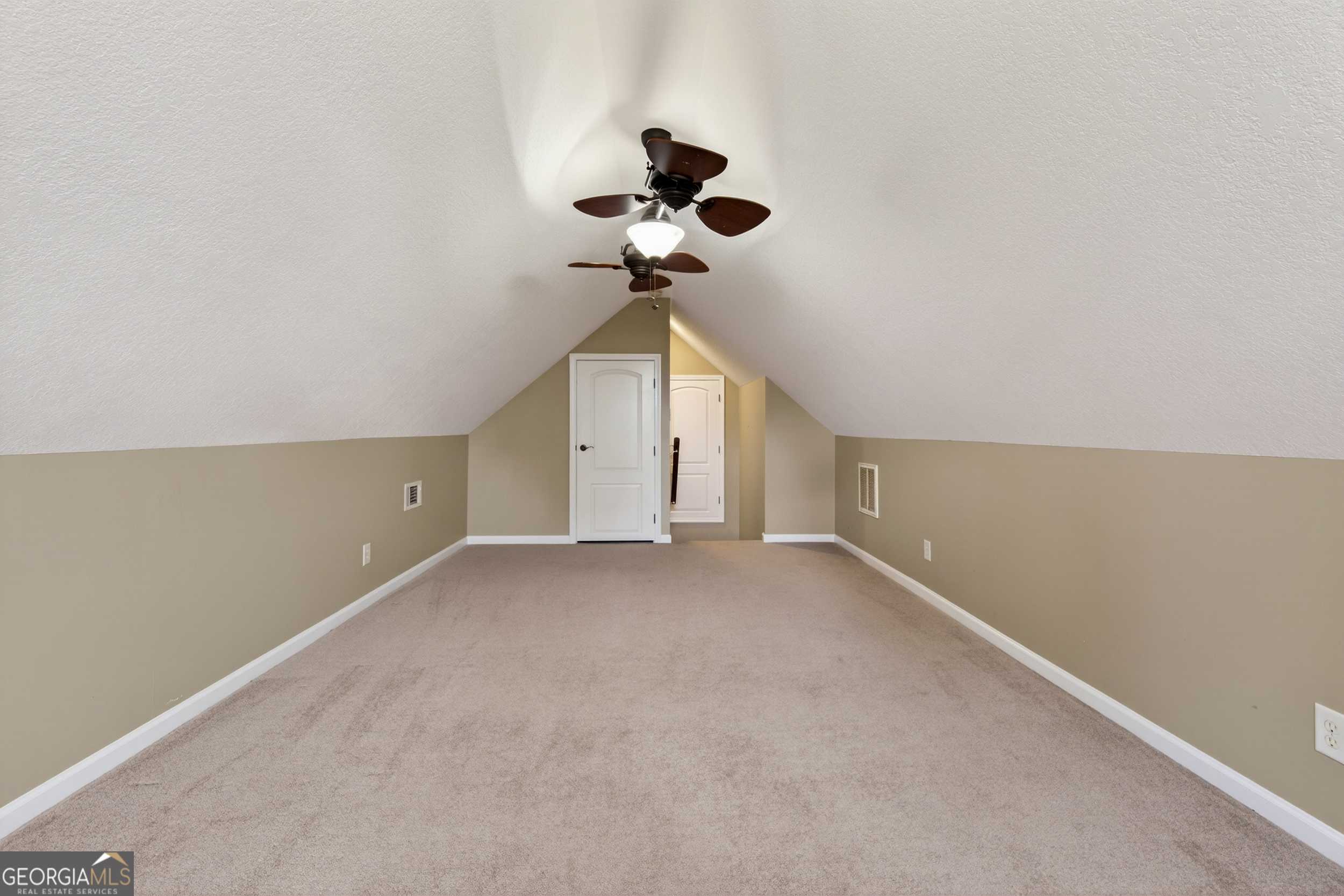 1211 Parham Town Road Bowman, GA 30624 - Photo 38 of 86 a view of a ceiling fan and hardwood floor