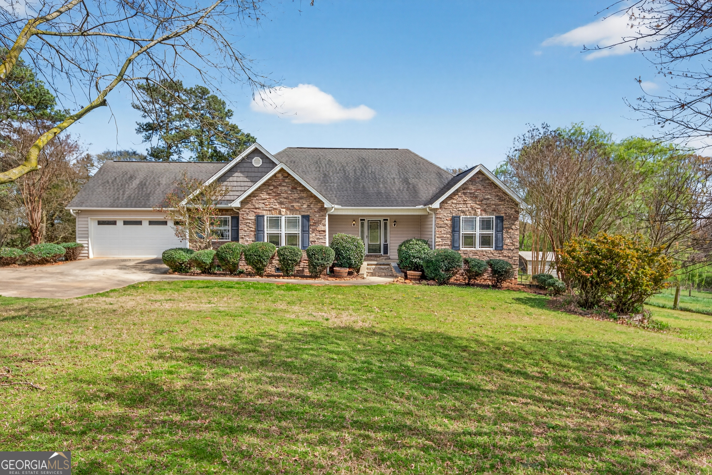 1211 Parham Town Road Bowman, GA 30624 - Photo 42 of 86 a front view of house with yard and green space