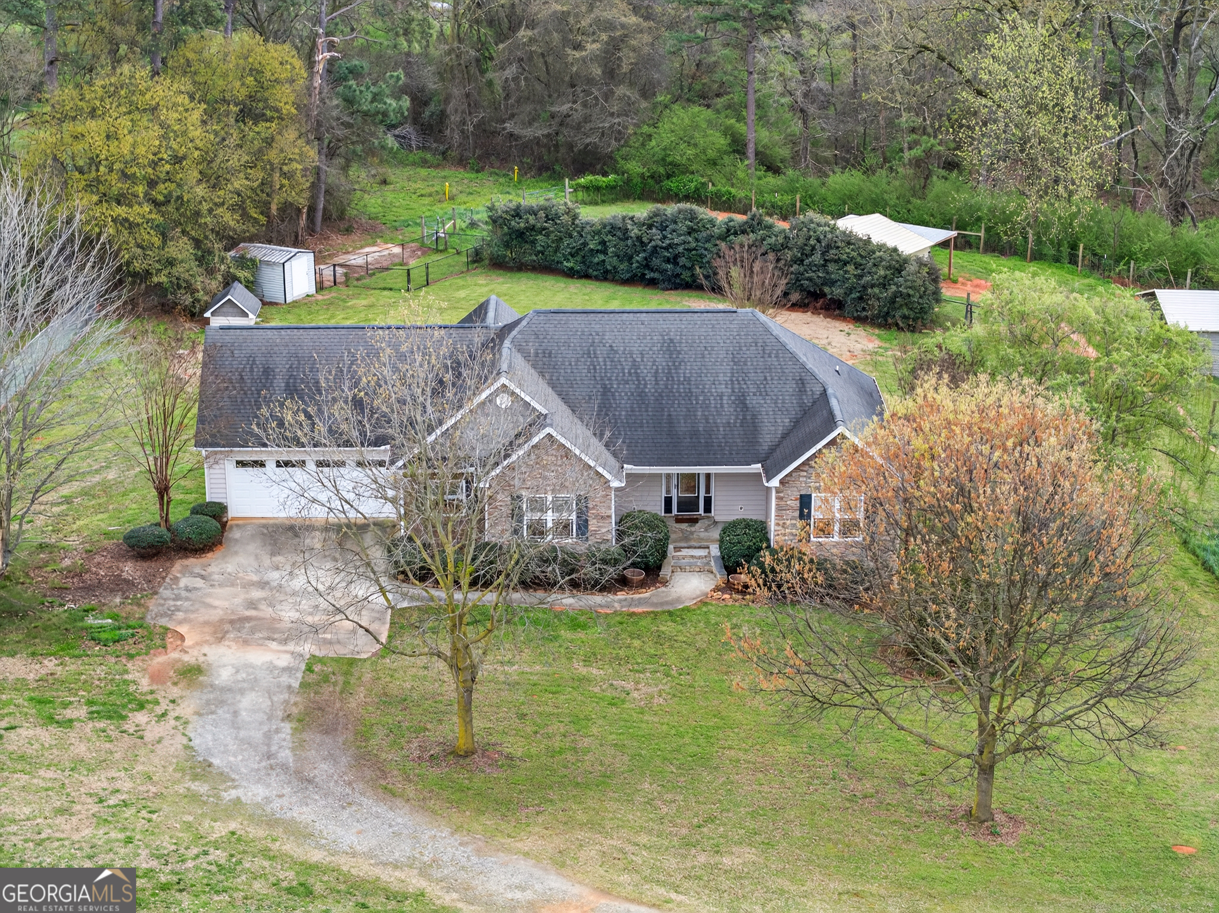 1211 Parham Town Road Bowman, GA 30624 - Photo 58 of 86 an aerial view of a house with garden space and street view