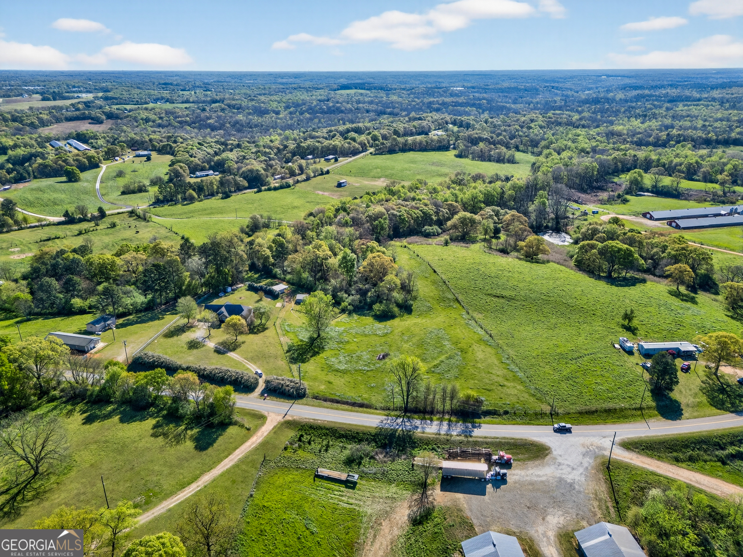 1211 Parham Town Road Bowman, GA 30624 - Photo 83 of 86 an aerial view of a houses with a yard