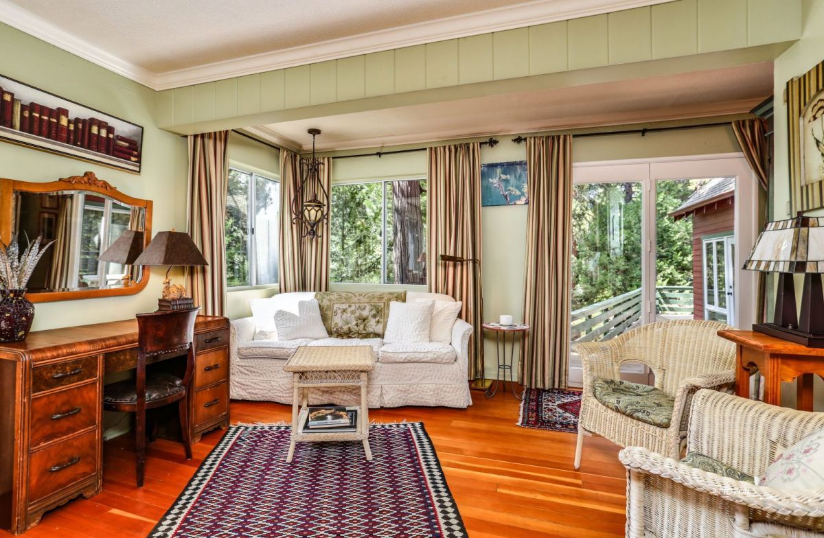 25891 Wayne Road Idyllwild, CA 92549 - Photo 31 of 72 a living room with furniture and a floor to ceiling window