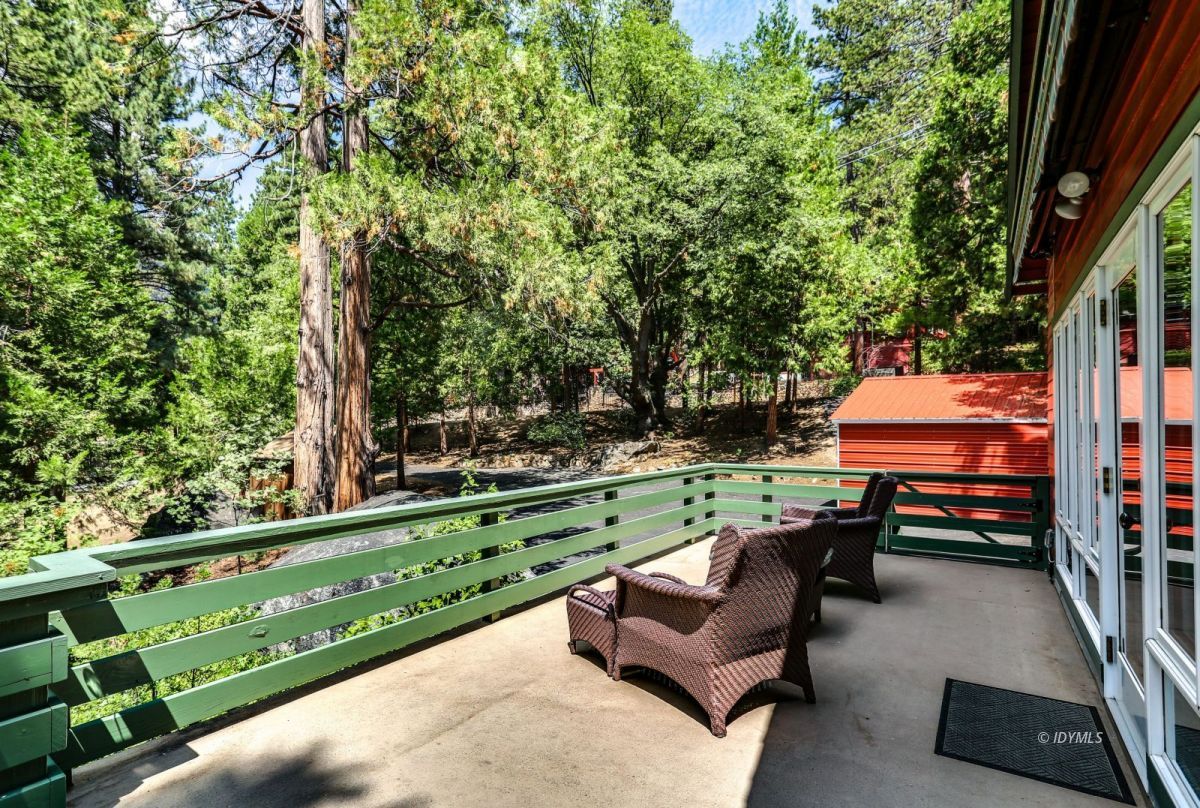 25891 Wayne Road Idyllwild, CA 92549 - Photo 61 of 72 a backyard of a house with table and chairs