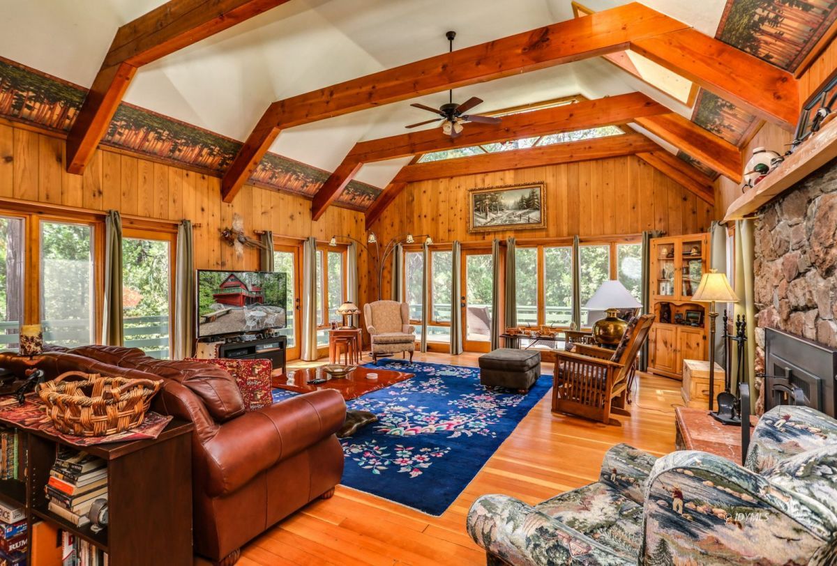 25891 Wayne Road Idyllwild, CA 92549 - Photo 10 of 72 a living room with furniture a couch and large windows