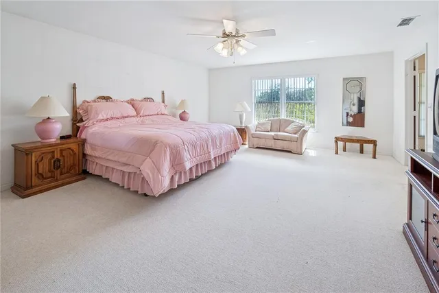 a view of a workspace with furniture and cabinet