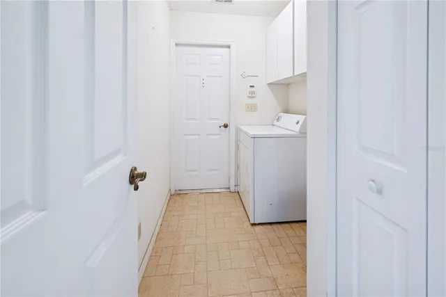 a bedroom with a bed and a mirror