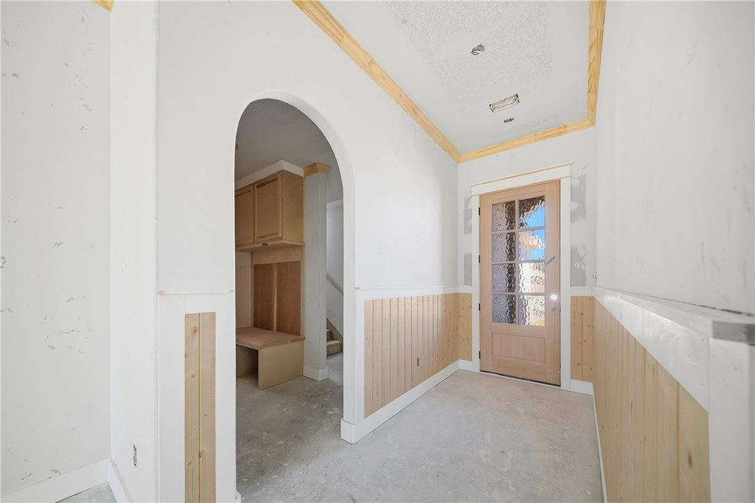 5016 Booth Falls Trail Bryan, TX 77802 - Photo 6 of 18 a view of an empty room with a fireplace and a window