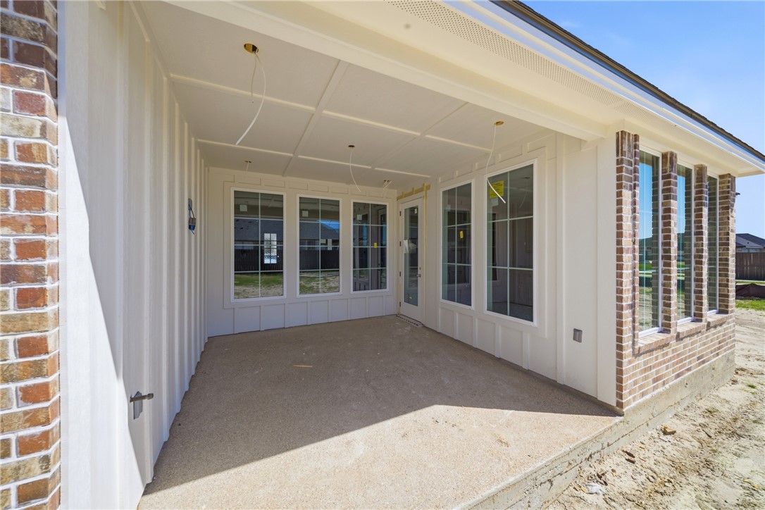 5016 Booth Falls Trail Bryan, TX 77802 - Photo 10 of 18 front view of a house with a large window