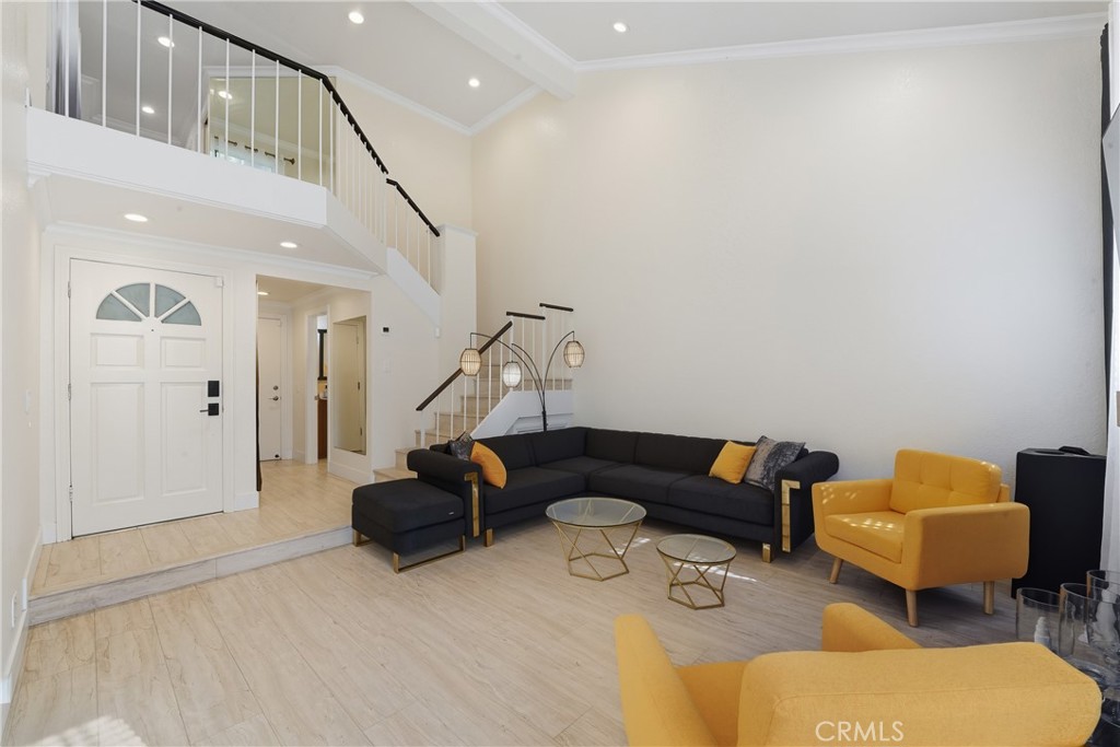 6070 East Summit Court Anaheim Hills, CA 92807 - Photo 18 of 60 a living room with furniture and a stairs