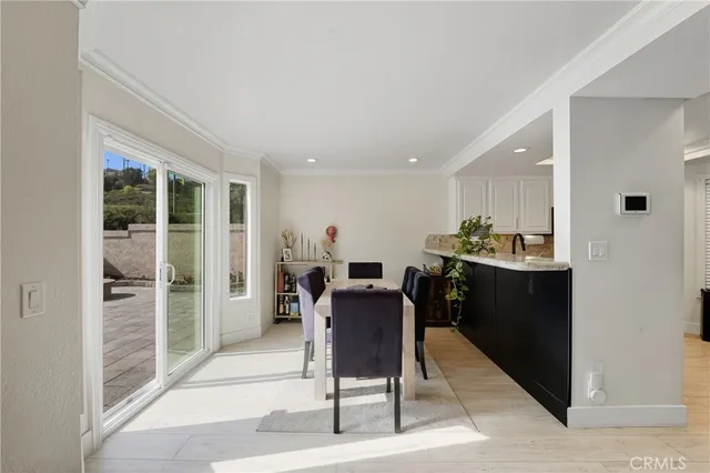 a kitchen with a sink and a stove top oven