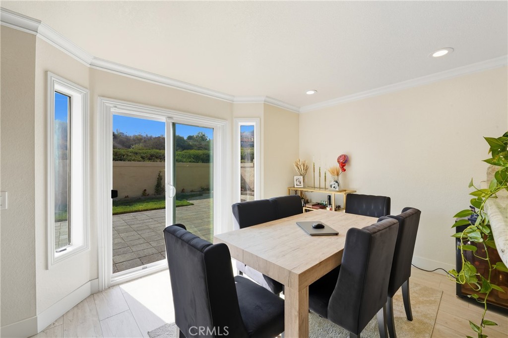 6070 East Summit Court Anaheim Hills, CA 92807 - Photo 28 of 60 a view of a dining room with furniture window and outside view