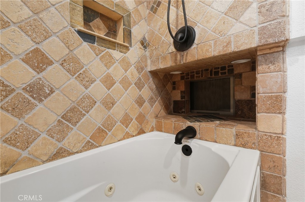 6070 East Summit Court Anaheim Hills, CA 92807 - Photo 32 of 60 a bathroom with a sink and a bathtub
