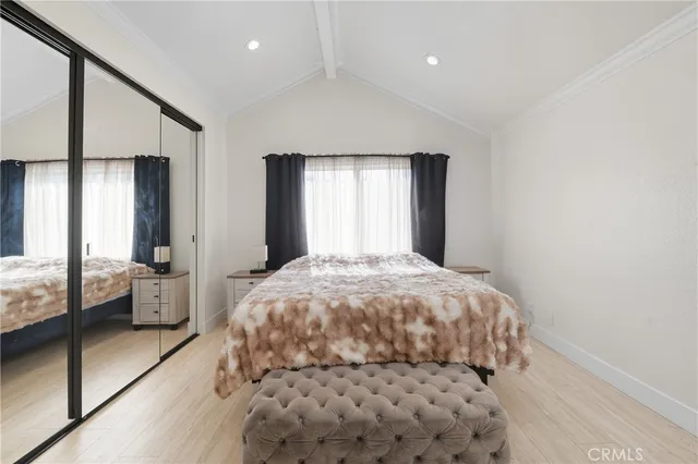 a kitchen with a refrigerator and a sink