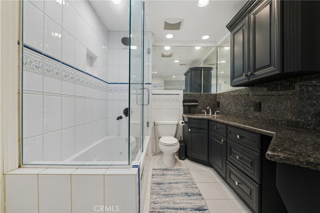 6070 East Summit Court Anaheim Hills, CA 92807 - Photo 46 of 60 a kitchen with a refrigerator and a sink