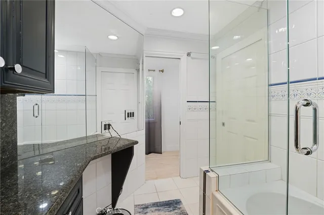 an outdoor space with furniture and umbrella