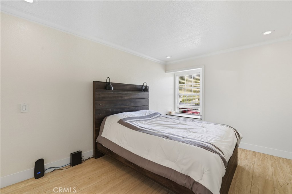 6070 East Summit Court Anaheim Hills, CA 92807 - Photo 51 of 60 a bedroom with a bed and a window