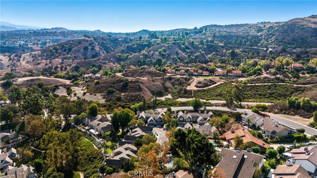6070 East Summit Court Anaheim Hills, CA 92807 - Photo 8 of 60 an aerial view of residential house with green space