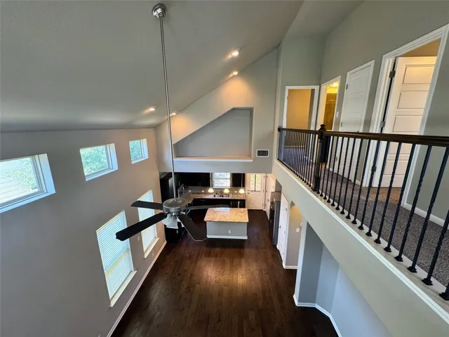 a kitchen with sink refrigerator and stove