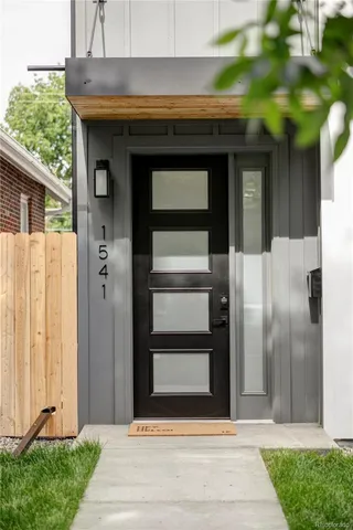 a front view of a house with a tub