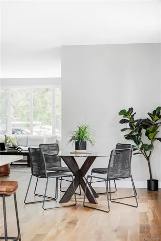 a view of a livingroom with furniture and a window