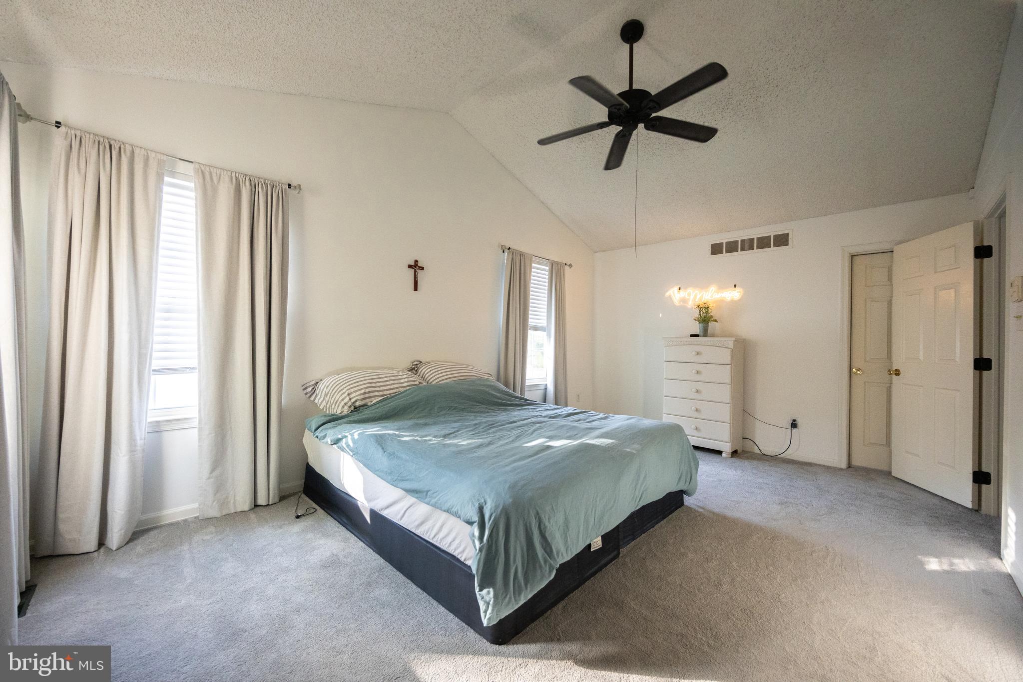 15 Timber Court Glassboro, NJ 08028 - Photo 18 of 32 a spacious bedroom with a bed and window