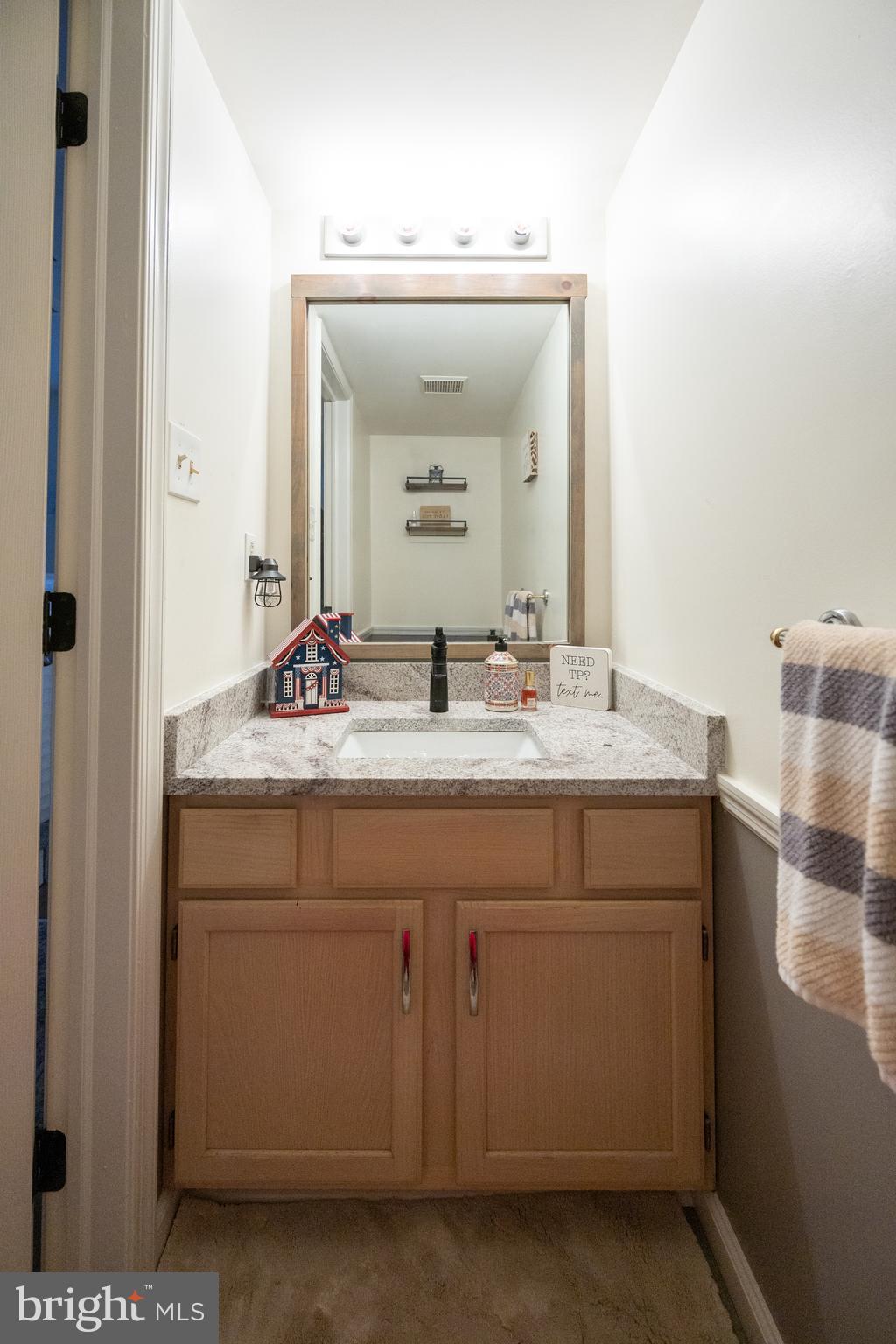 15 Timber Court Glassboro, NJ 08028 - Photo 20 of 32 a bathroom with a sink and a mirror