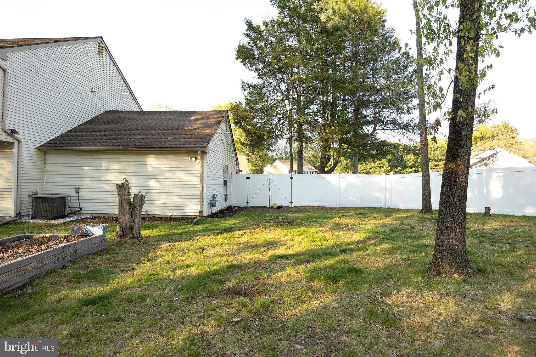 15 Timber Court Glassboro, NJ 08028 - Photo 29 of 32 a view of an house with backyard