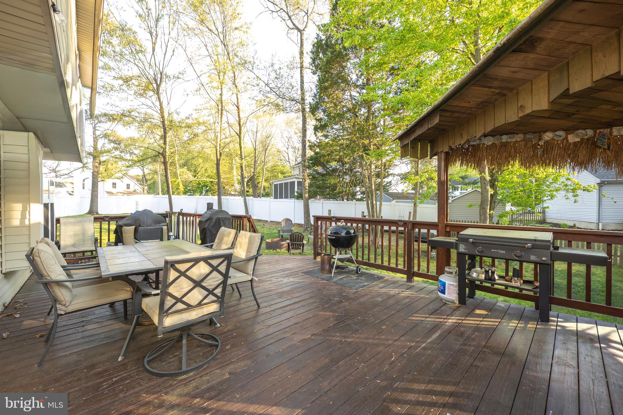 15 Timber Court Glassboro, NJ 08028 - Photo 32 of 32 a view of chairs and tables in the patio