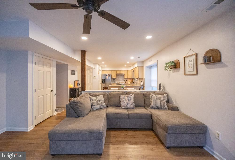 15 Timber Court Glassboro, NJ 08028 - Photo 10 of 32 a view of living room kitchen with furniture and a ceiling fan