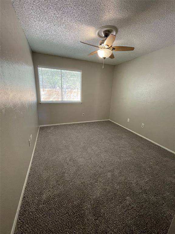 5301 Indio Circle Austin, TX 78745 - Photo 3 of 16 wooden floor in an empty room with a window