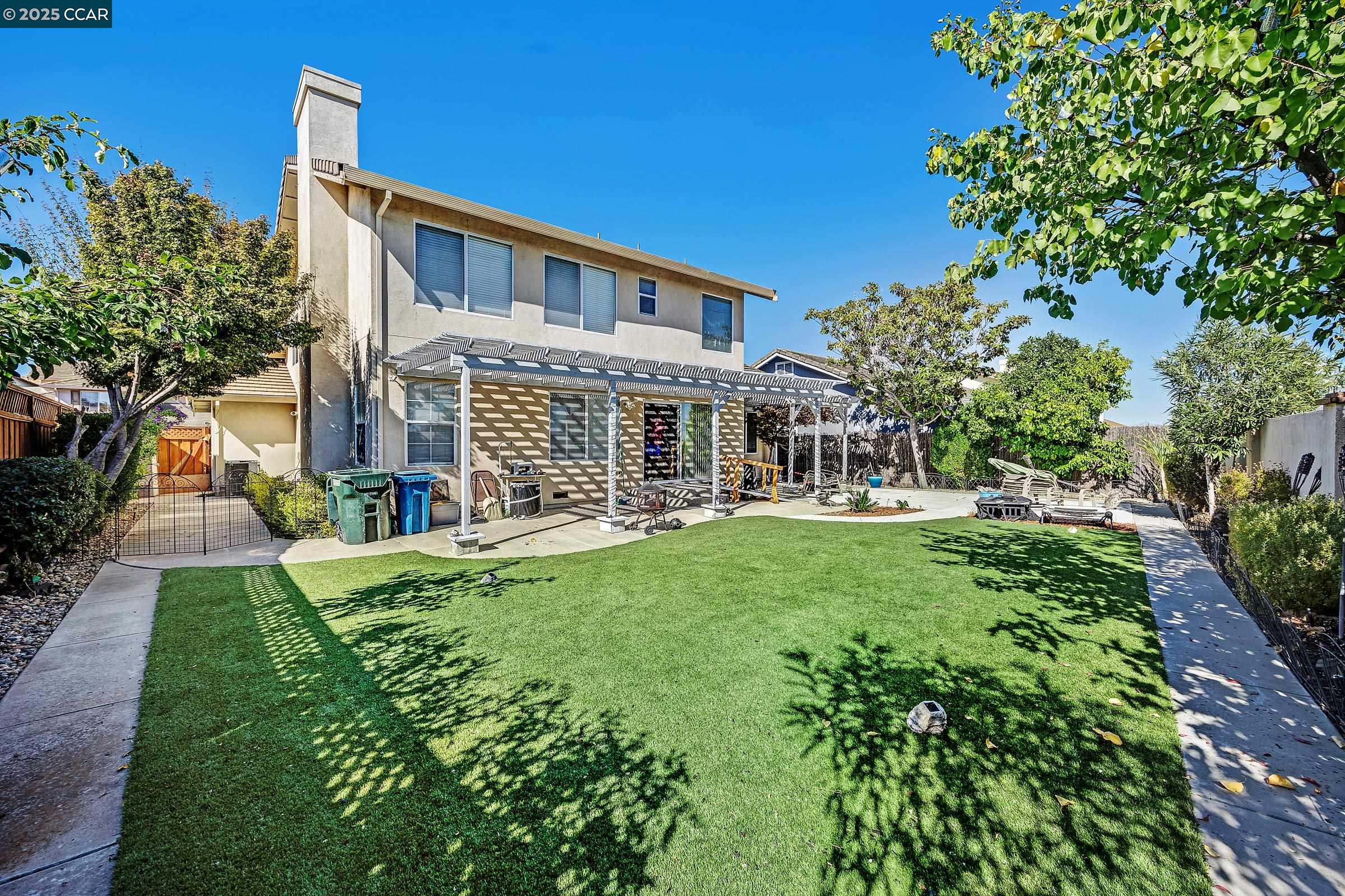 4653 Arabian Way Antioch, CA 94531 - Photo 3 of 13 a front view of a house with a yard